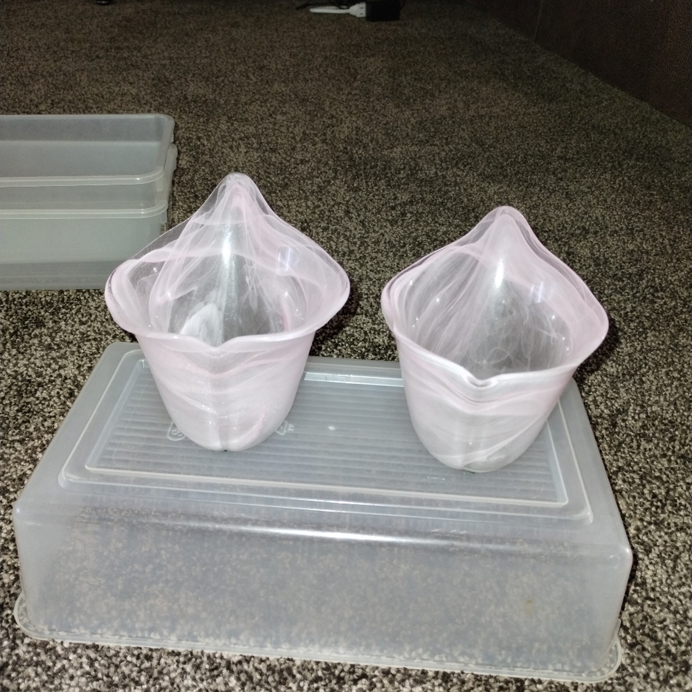Set of 2 pointed blown glass candle holders.